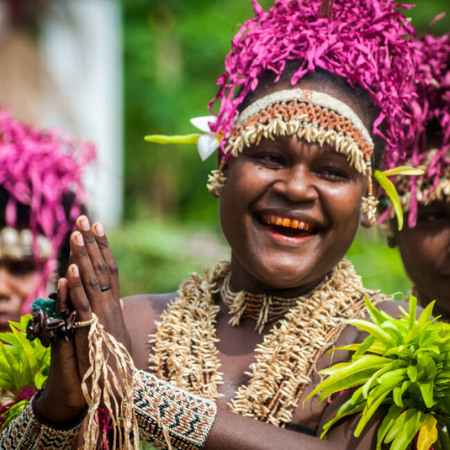 Lips stained from chewing betel nut. Santa Ana Island, Solomon Islands.