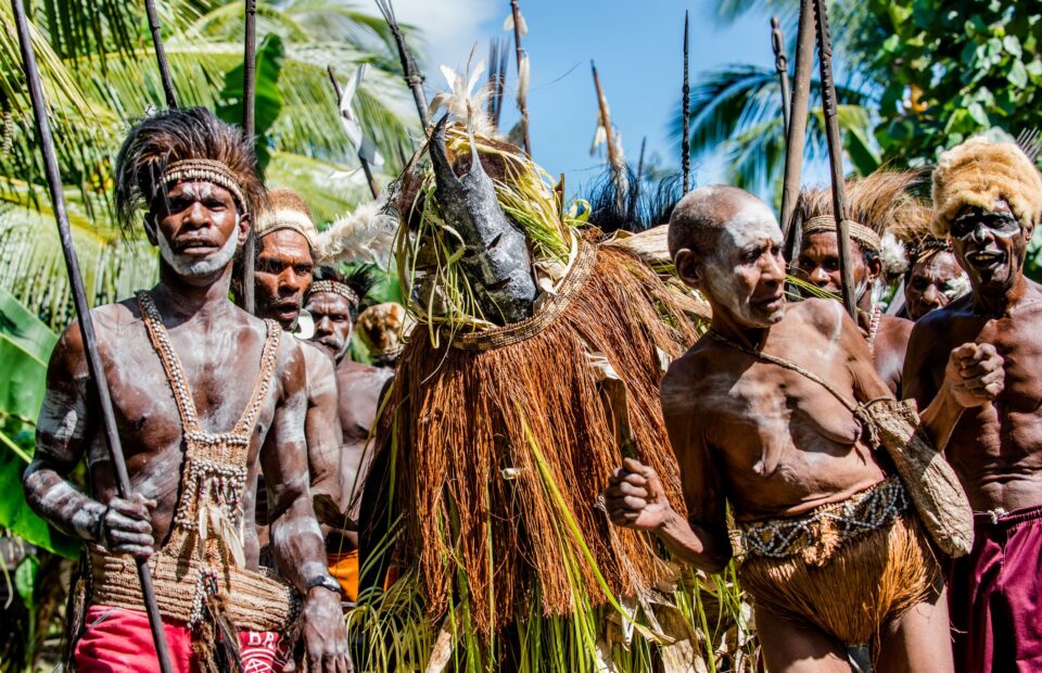 Ancestors, embodied by spirit masks touring the village . Youw Village, Atsy District, Asmat. New Guinea.